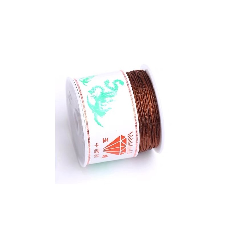 CORD, JADE, 0.7MM, BROWN. SOLD PER SPOOL OF 50M.